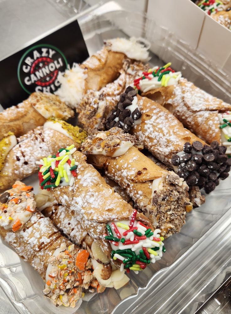 Mixed cannoli tray with colorful toppings