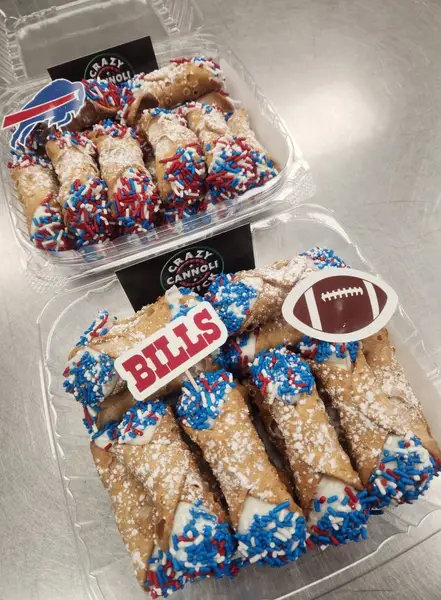 Buffalo Bills cannoli tray with red white and blue sprinkles and bison pick