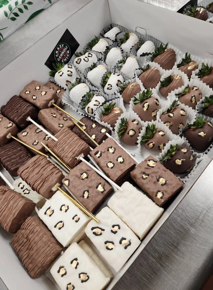 Assorted chocolate dipped treats and brownie bites