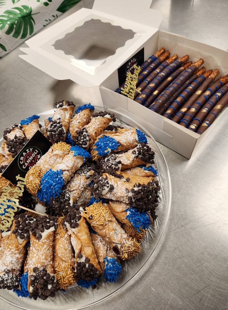 Mixed cannoli round platter with dark toppings